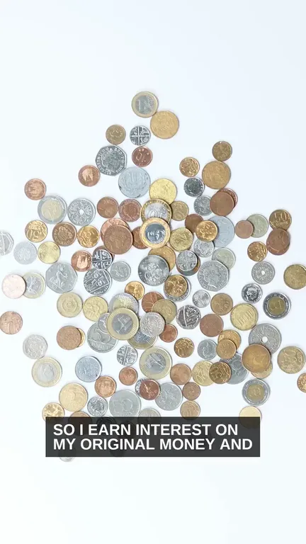 A hand scooping up coins, from our compound-interest faceless explainer